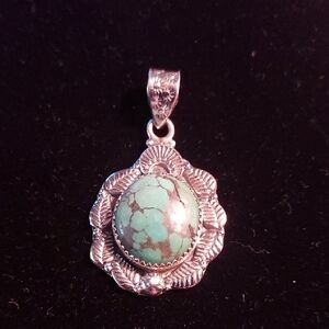 Elegant Silver Pendant with Turquoise Stone
